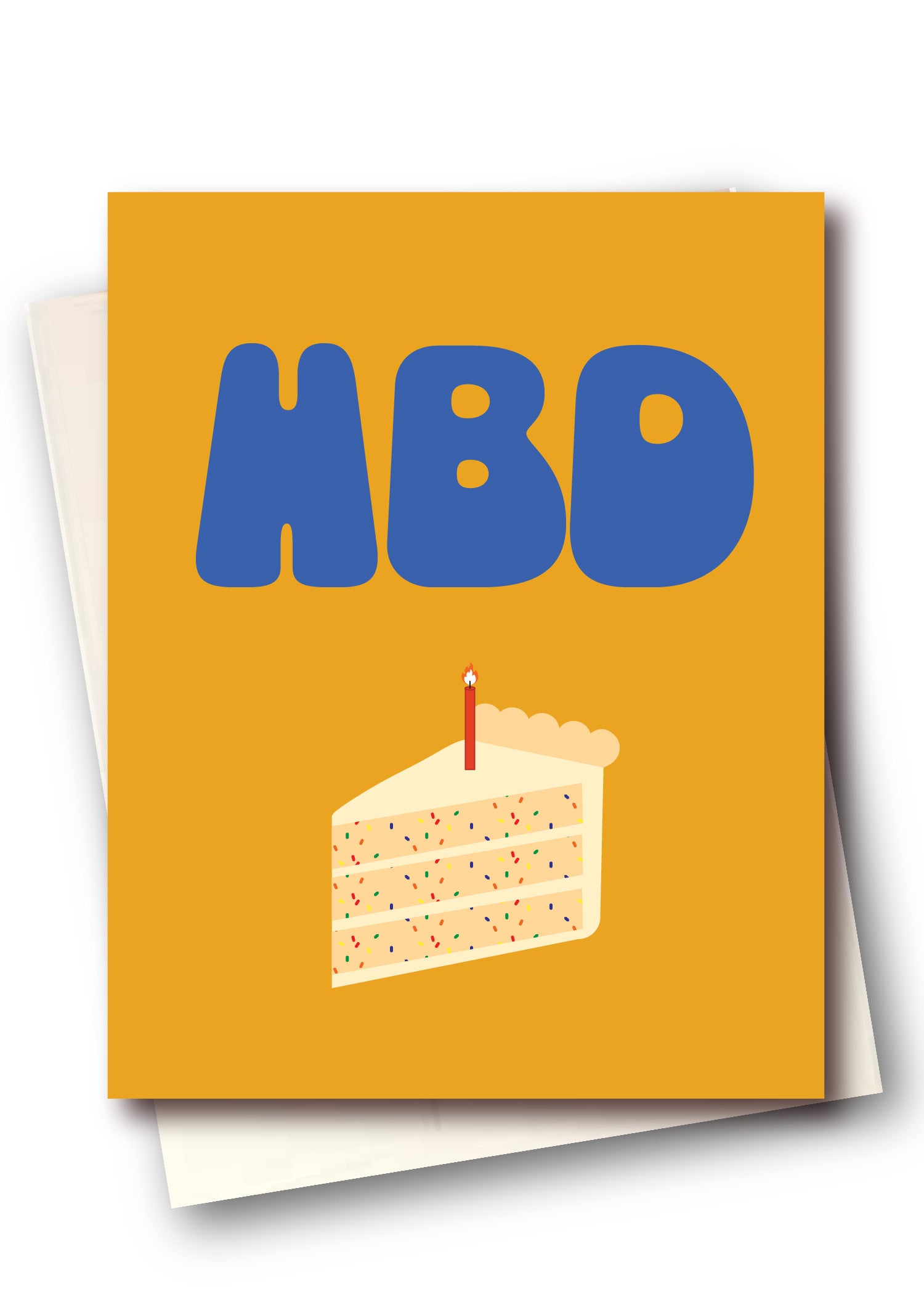 A square greeting card with a mustard yellow front featuring the text 'HBD' in large blue letters above a cartoon slice of layered cake with a single candle. A white envelope is partially visible behind the card on a white background.