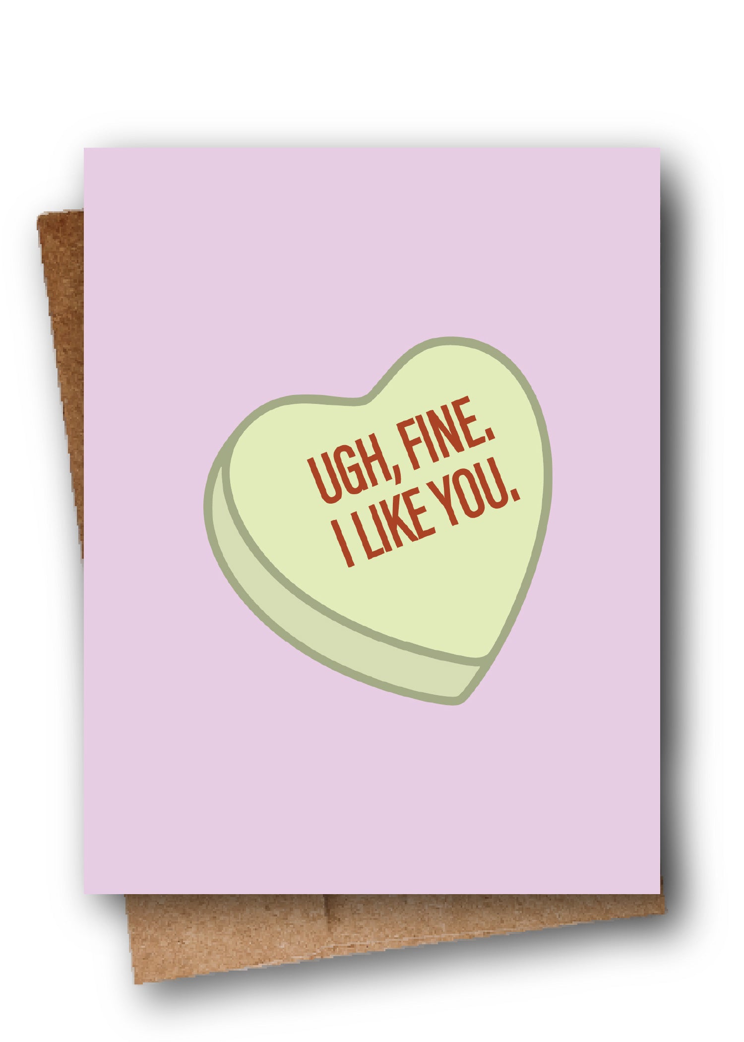 Card with a heart-shaped candy on a purple background