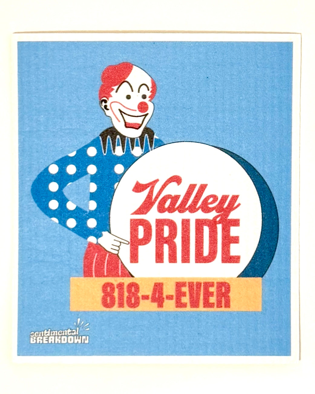 A vintage-style rectangular sign or card with a blue striped background, featuring a clown illustration and the text 'Valley PRIDE' and '818-4-EVER', photographed against a plain light wall.